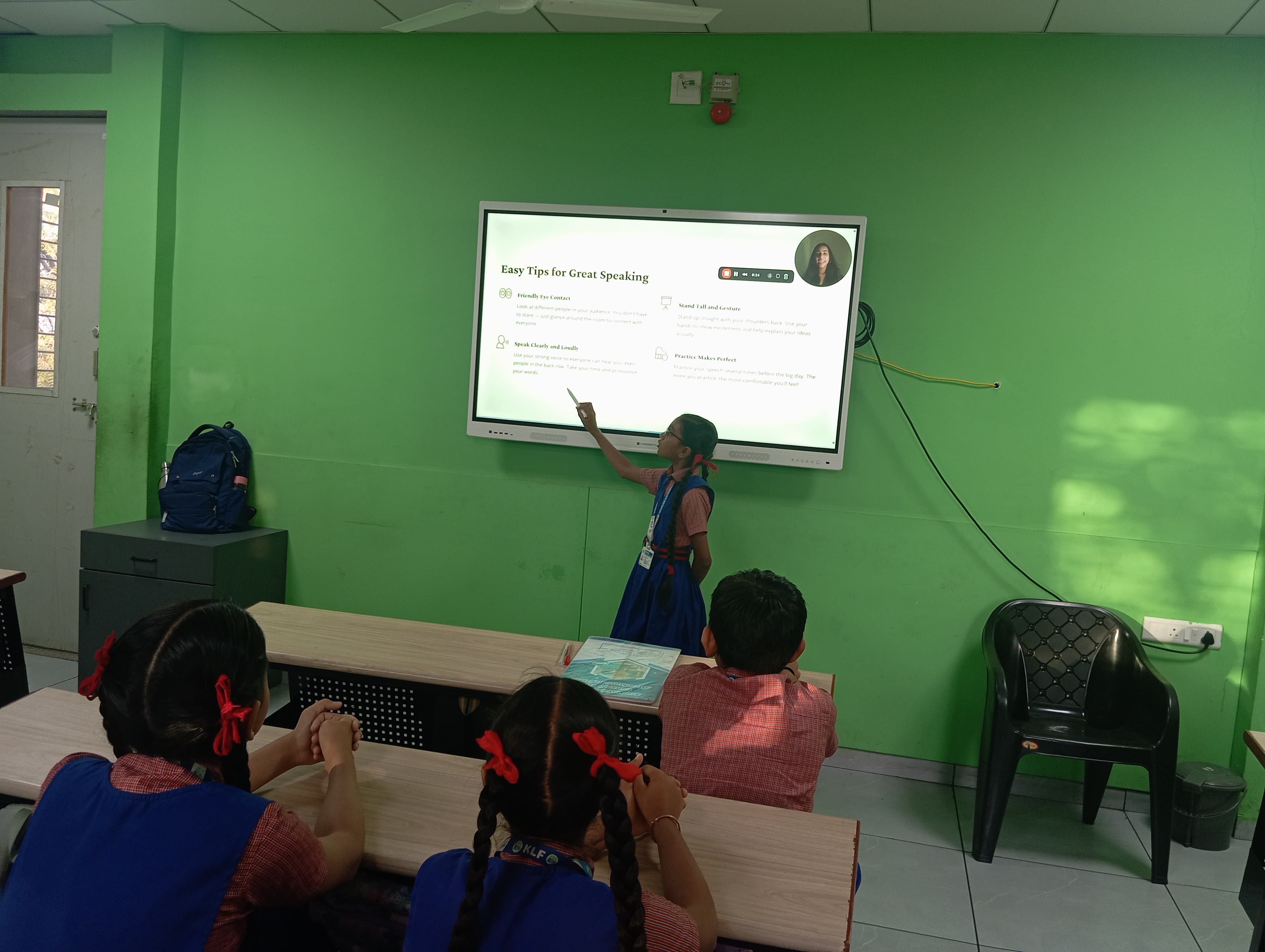 Students and tutors working together around a table